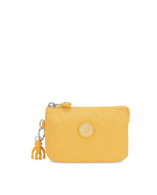 Monedero de mujer Kipling multiusos en color amarillo