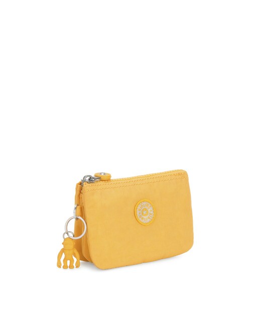 Monedero de mujer Kipling multiusos en color amarillo