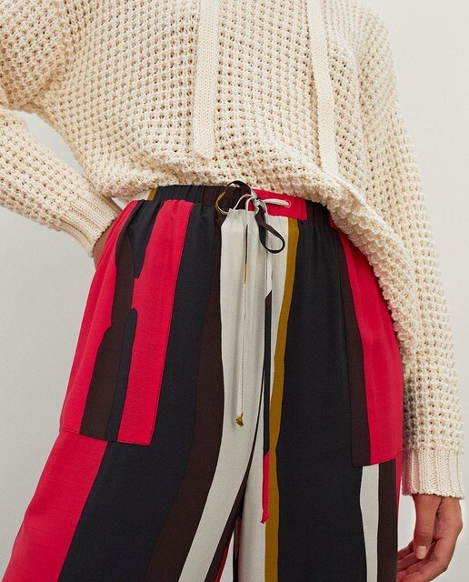 Pantalones de mujer anchos de rayas en fucsia