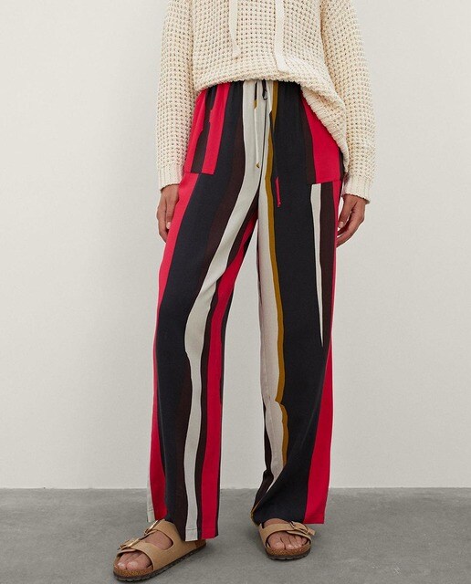 Pantalones de mujer anchos de rayas en fucsia