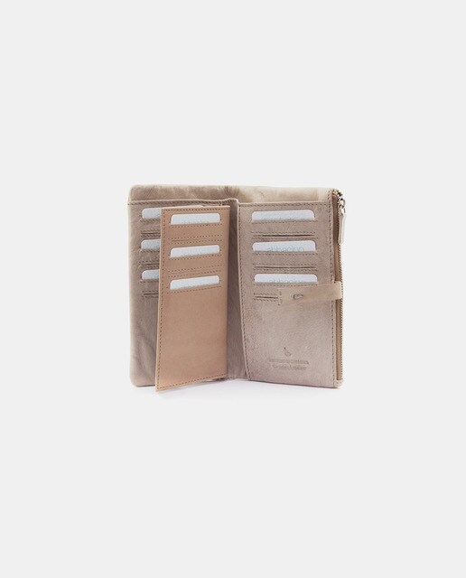 Cartera grande de mujer Abbacino Verola de piel en color beige troquelada
