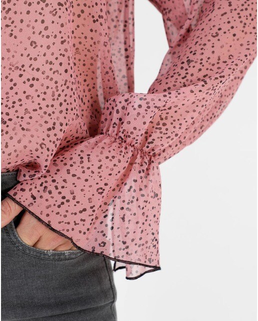 Blusa de mujer semitransparente con estrellas