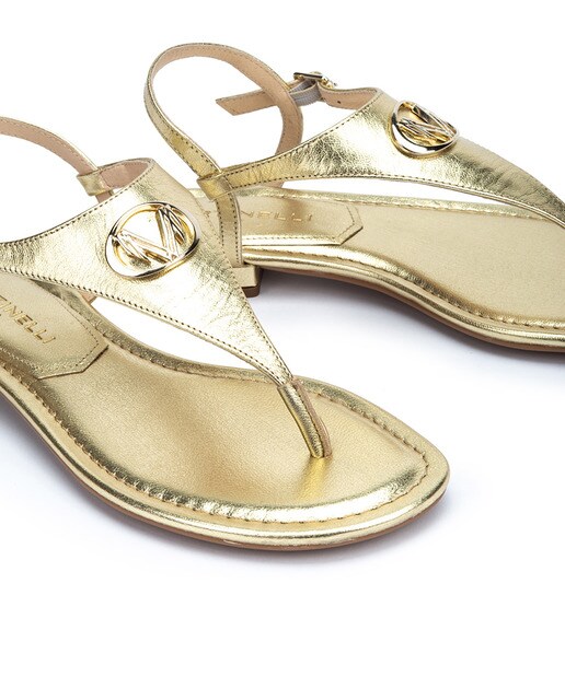 Sandalias planas de mujer Martinelli de piel con hebilla en color oro
