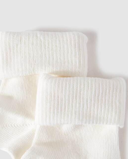 Calcetines lisos de bebé niño Cotton Juice en blanco