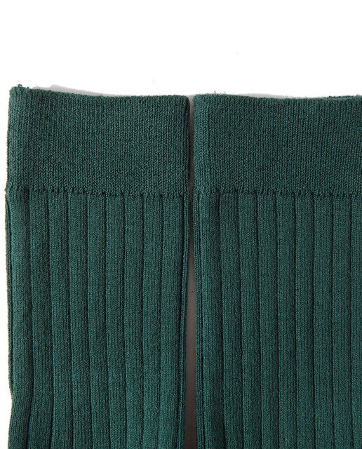 Calcetines básicos de niño en verde oscuro