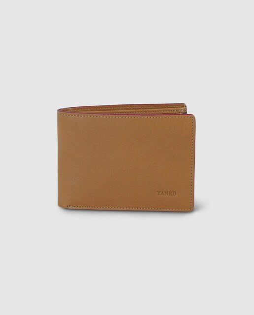 Cartera de piel color cuero con monedero