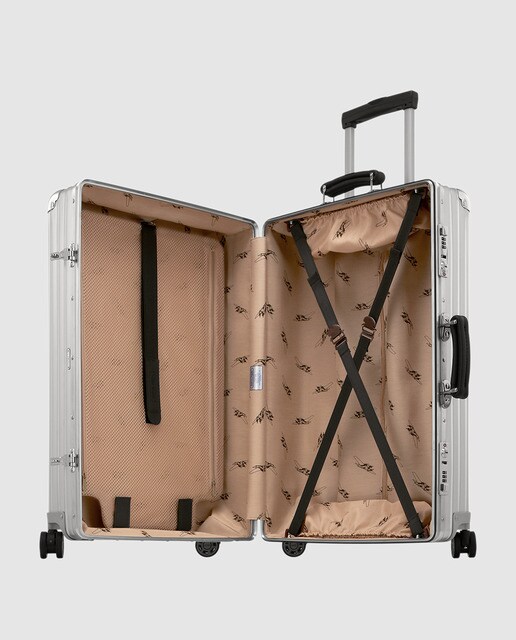 Maleta mediana Rimowa CLASSIC FLIGHT rígida color plata, con capacidad 60L