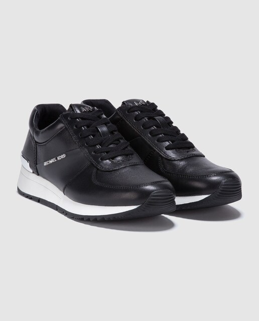 Zapatillas de piel de mujer Michael Kors de color negro. Modelo ALLIE TRAINER.