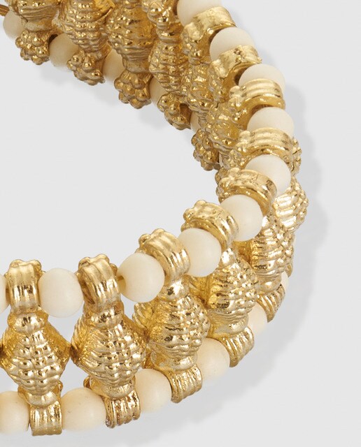 Pulsera El Corte Inglés blanca y dorada