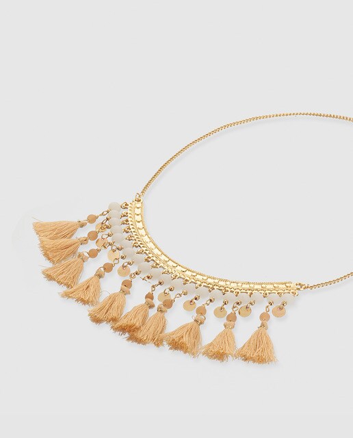 Collar El Corte Inglés con pompones beige