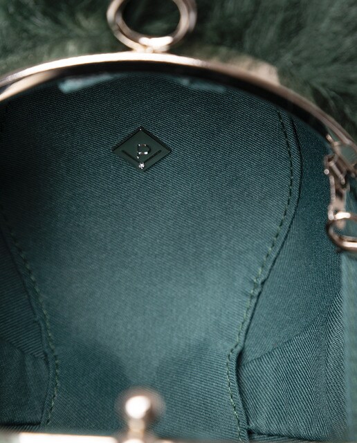 Clutch redondo de fiesta Volum de pelo sintético en verde
