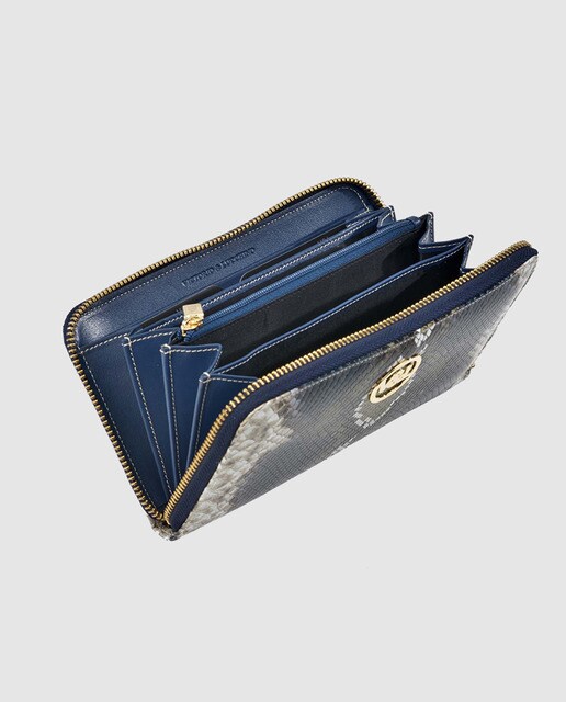 Cartera de mujer Victorio & Lucchino de piel grabada azul