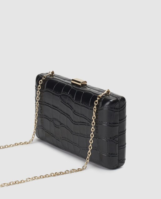 Clutch de fiesta El Corte Inglés en negro con grabado coco