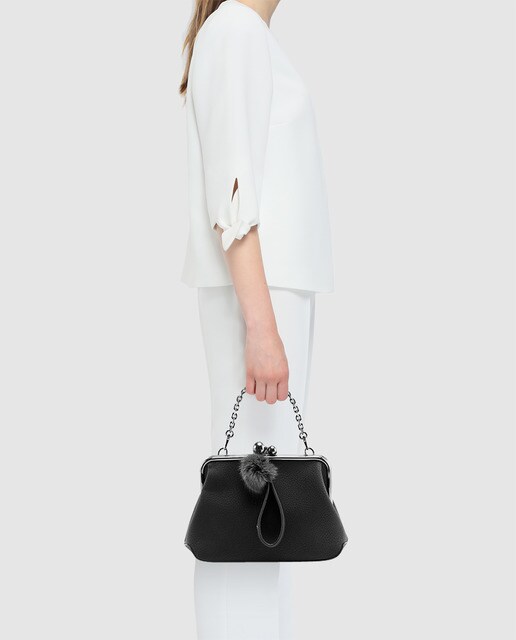 Bolso de mano pequeño de fiesta Abbacino en negro con boquilla