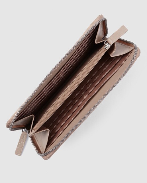 Cartera grande de mujer El Corte Inglés de piel nude con grabado coco