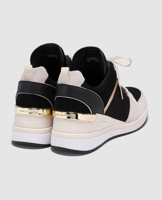 Zapatillas de piel de mujer Michael Kors multicolor con detalle metlicos. Modelo GEORGIE TRAINER.