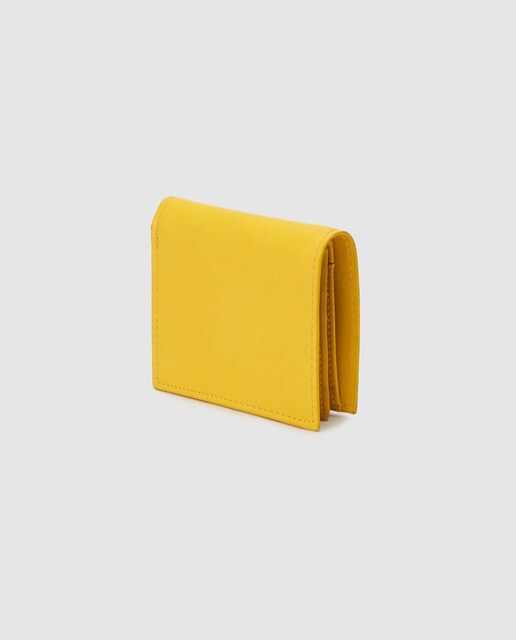 Cartera de mujer Gloria Ortiz amarilla con solapa