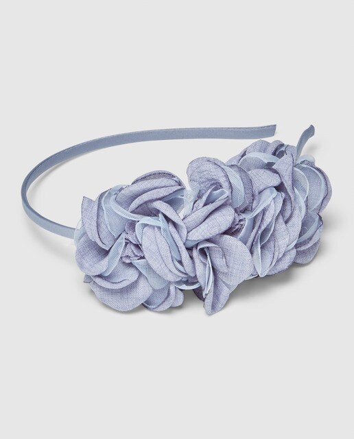 Diadema de niña azul con flores