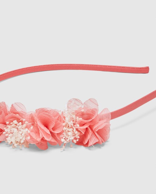Bandolete coral de bebé menina com flores