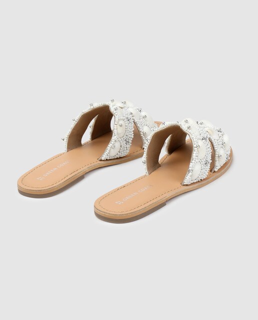 Sandalias planas de mujer Green Coast de color plata con adorno conchas