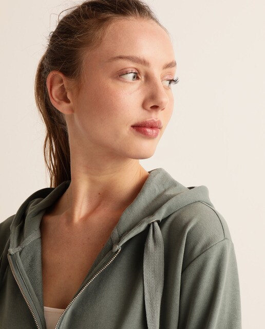 Sweatshirt de mulher com fecho de correr, capuz e bolsos
