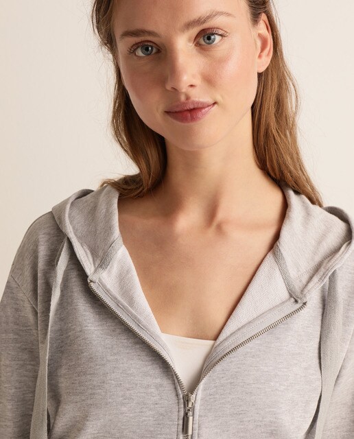 Sweatshirt de mulher com fecho de correr, capuz e bolsos