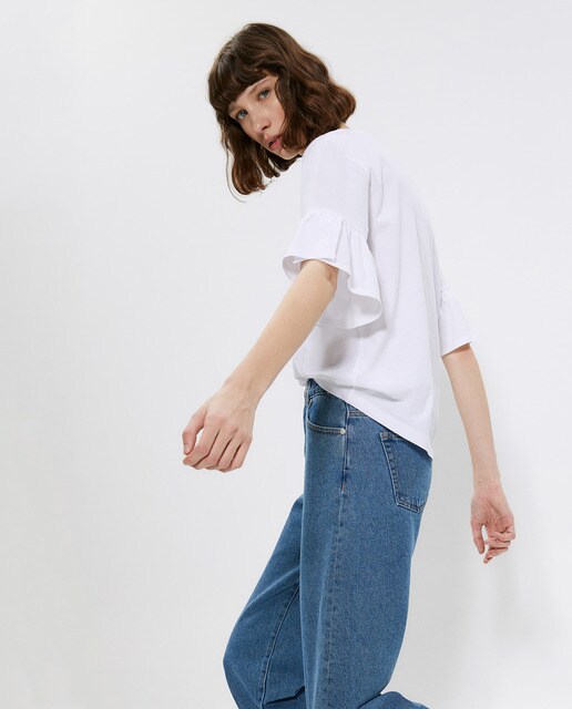 Camiseta lisa de mujer con volante