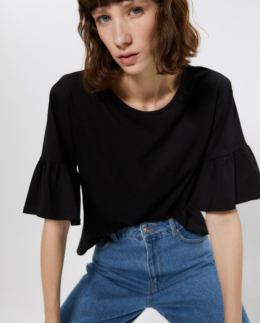 Camiseta lisa de mujer con volante