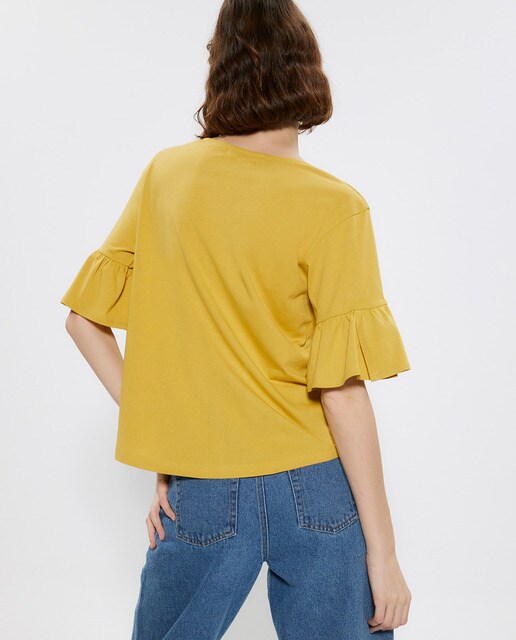 Camiseta lisa de mujer con volante