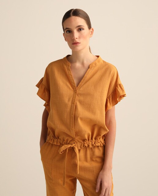 Blusa de lino de mujer con volantes