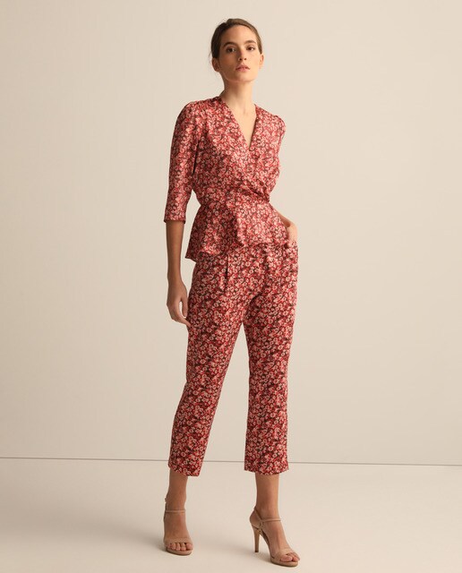Blusa cruzada de mujer con peplum