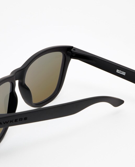 Gafas de sol unisex Hawkers One redondeadas en negro liso y lente azul