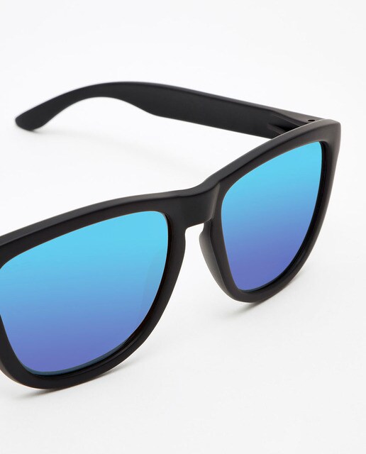 Gafas de sol unisex Hawkers One redondeadas en negro liso y lente azul