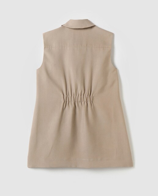 Chaleco beige de mujer con doble botón