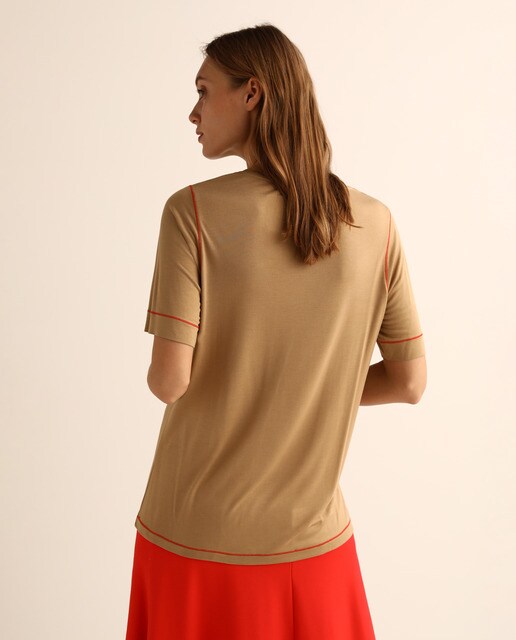 Camiseta larga de mujer con costuras