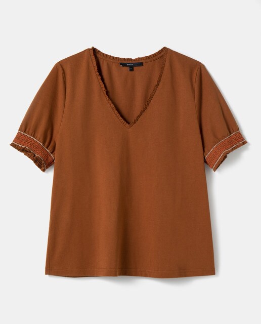 Camiseta de mujer con volantes y nido de abeja