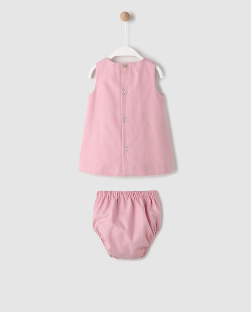 Vestido rosa de bebé com ondas