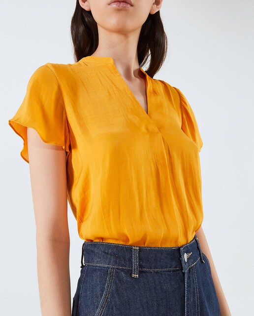 Blusa lisa de mujer manga volante
