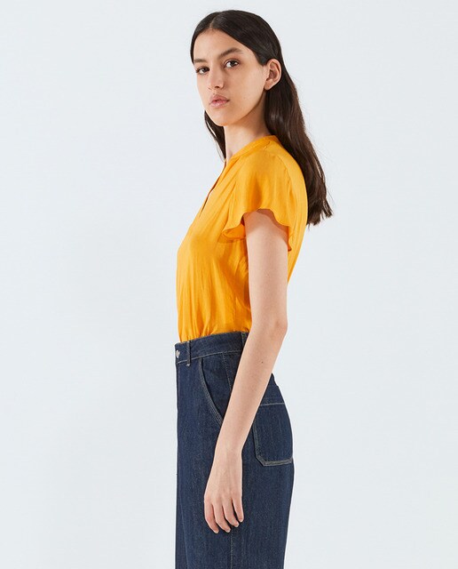 Blusa lisa de mujer manga volante