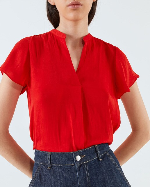 Blusa lisa de mujer manga volante