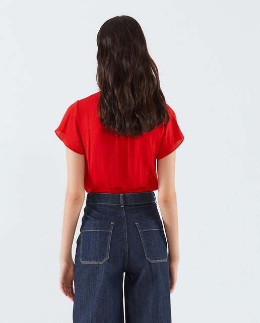 Blusa lisa de mujer manga volante