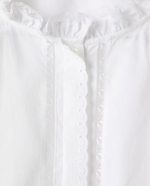 Blusa de mujer de estilo romántico en blanco