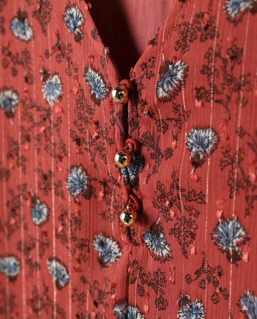 Vestido fluido con volantes