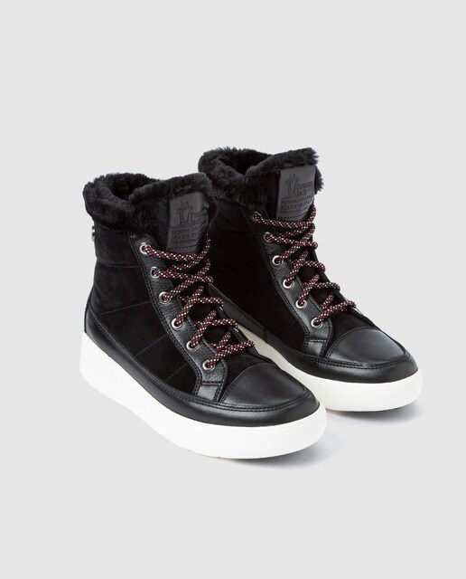 Botas em pele e camurça pretas