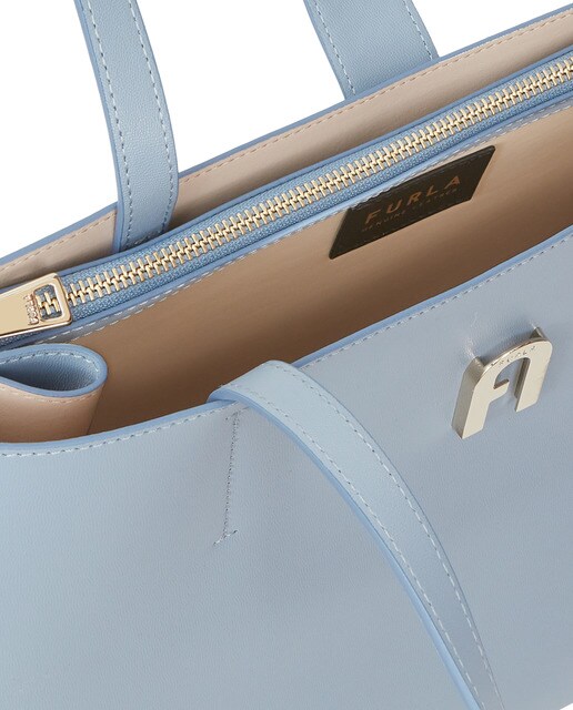 Tote grande Furla Sofia de piel en azul claro con apoyos metálicos