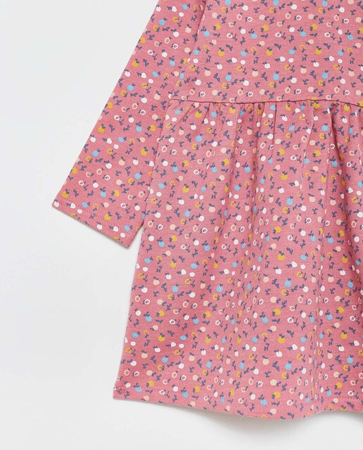 Vestido rosa de bebé com estampado floral