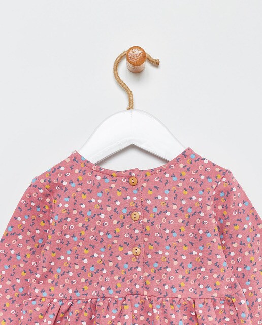 Vestido rosa de bebé com estampado floral
