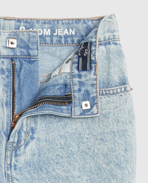 Jeans azuis de menina