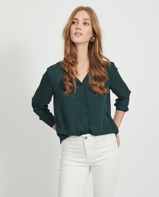 Top de manga comprida de mulher com decote em bico