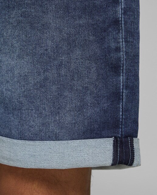 Bermudas de ganga azuis de homem